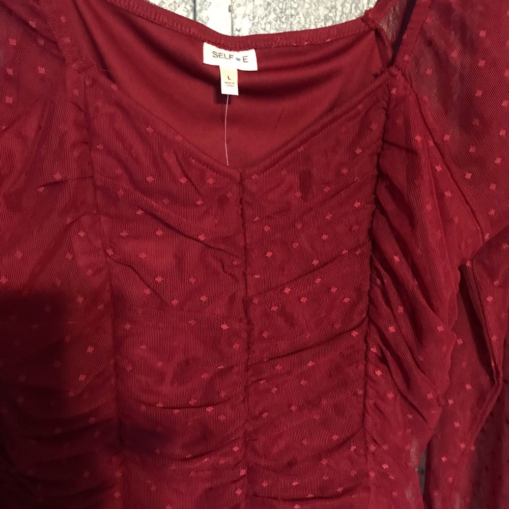 New with tags burgundy top